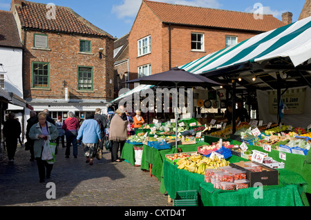 Busy local Fresh fruit and veg vegetable outdoor open air markets stall stalls on Newgate Market York North Yorkshire England UK Great Britain Stock Photo