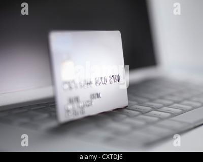 Close up of credit card on keyboard Stock Photo
