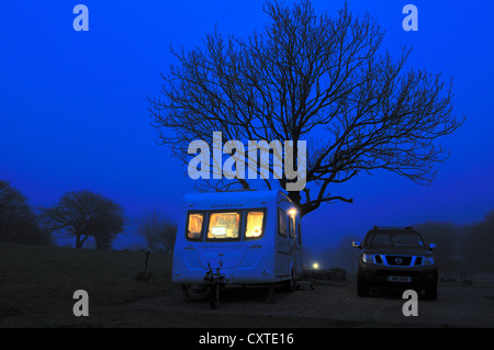Camping In Winter Season At Night Lantern Shining In The Tent Mount Skerfe And Sarek National Park In Background Jokkmokk County Sarek National Pa Stock Photo Alamy