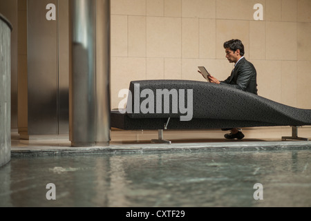 Businessman using tablet computer Stock Photo