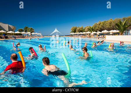 An aqua aerobics class at a holiday complex in Myrina on Lemnos, Greece. Stock Photo