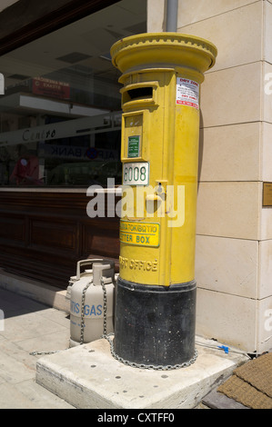 dh Postbox POST CYPRUS Old British yellow pillarbox box Stock Photo