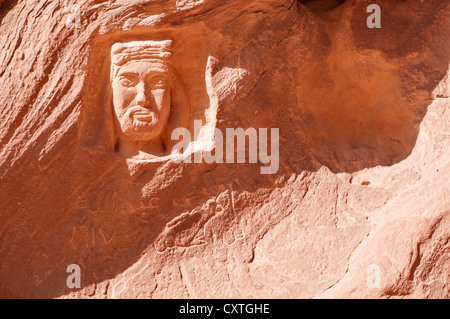 Carved portrait of King Abdullah I, Wadi Rum, Jordan Stock Photo