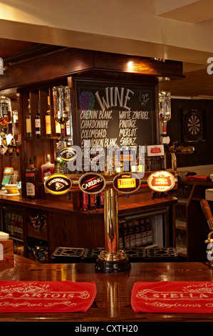Stella artois Guinness strongbow tetleys  Beer pumps on a bar in a pub