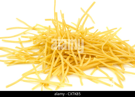 Golden yellow dry soup noodles isolated on white background. Stock Photo