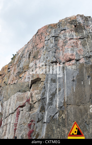 road sign waring about falling stones, rocks Stock Photo