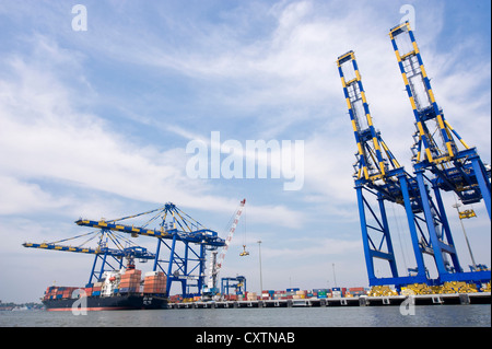 Horizontal view of a container liner loaded with cargo at the new Vallarpadam Container terminal at Fort Cochin in Kerala. Stock Photo