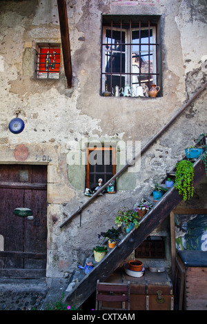 Stairs, doors, and windows in a narrow street in Murten, Switzerland Stock Photo