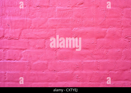 Painted red brick wall as a background image Stock Photo
