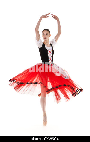 Teenage ballerina in Italian style romantic tutu performing a pirouette Stock Photo