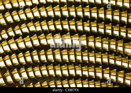 Abstract image of coiled machining swarf from a metal lathe. Number 3