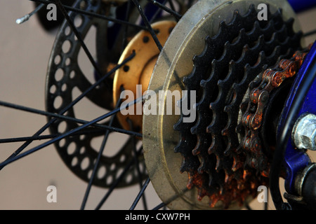 Bicycle gear assembly, freewheel and a rusty chain, the image showing the state of the gears and chain assembly hours after rain Stock Photo