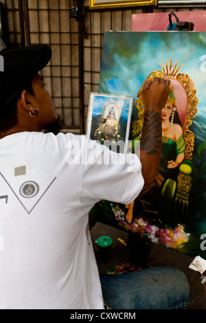 Portrait Artist in the Streets of Jakarta, Indonesia Stock Photo