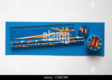 Stationery set with ruler, pencils, pencil, eraser, rubber, pencil sharpener isolated on white background - looking down on from above Stock Photo
