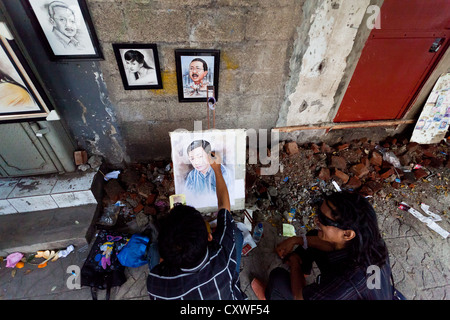 Portrait Artist in the Streets of Jakarta, Indonesia Stock Photo