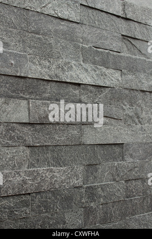 Grey slab textured wall Stock Photo
