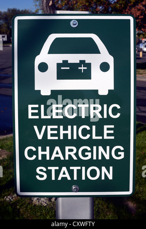 Sign marking 'Electrical Vehicle Charging Station' where energy conscious electric vehicles can be 'refueled.' Stock Photo