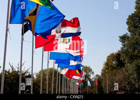 Multi national flags on poles Stock Photo