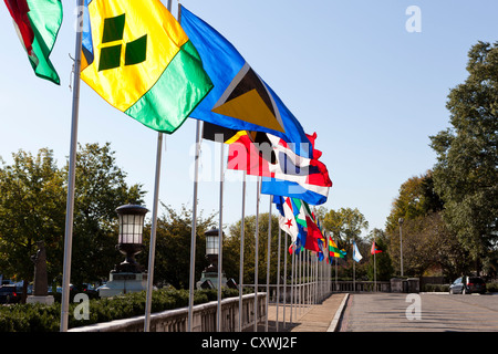 Multi national flags on poles Stock Photo