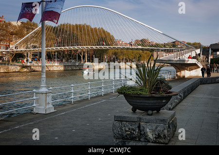 Zubizuri, white bridge, or Campo de Volantín, popularly in Calatrava, in an arch over the Nervión estuary in the city of Bilbao, Basque Country, Spain Stock Photo