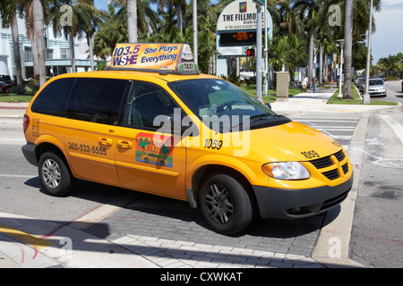yellow minivan cab taxi in miami south beach florida usa Stock Photo