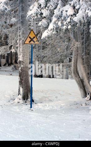 X sign at the edge of the ski area. Stock Photo