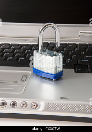 Unlocked laptop computer risk unsecure data Stock Photo