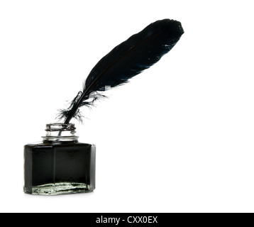 Feather and ink bottle on isolated white background Stock Photo