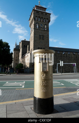 A Gold 2012 Olympic post box (pillarbox) in honour of Welsh cyclist Geraint Thomas in Castle Street Cardiff Wales UK  KATHY DEWITT Stock Photo