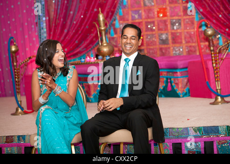 Laughing Indian couple at wedding Stock Photo