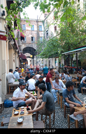 ISTANBUL, TURKEY. An outdoor cafe in a courtyard off Istiklal Caddesi in the Beyoglu district of the city. 2012. Stock Photo