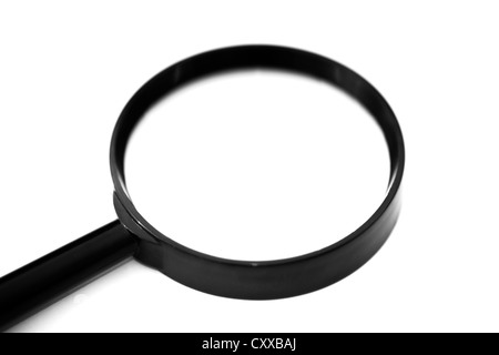 Magnifying glass cut out over white. Stock Photo