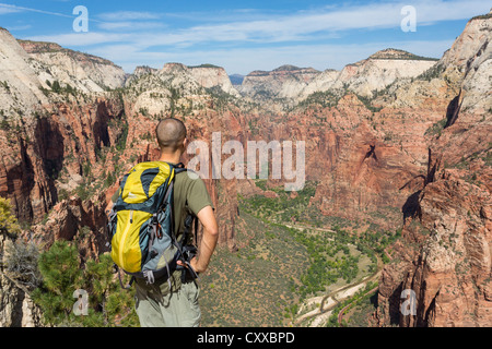 Male hiker at the top of the Angel's Landing trail in Zion National Park Stock Photo