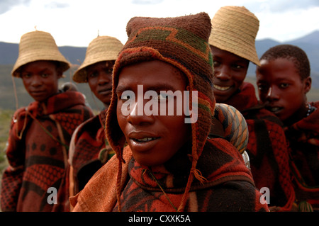 Group of young Basotho men wearing traditional Basotho blankets in Lesotho. Stock Photo