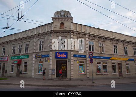 Shops in a wooden residential building along Avotu iela street Grīziņkalns the New town Riga Latvia Europe Stock Photo