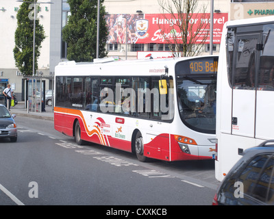 (Bus Eireann) Public Service Bus alighting passengers at a bus stop in historic Ayers Square Galway City in the West of Ireland. Stock Photo