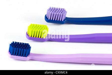 Three dental brushes on the white background Stock Photo