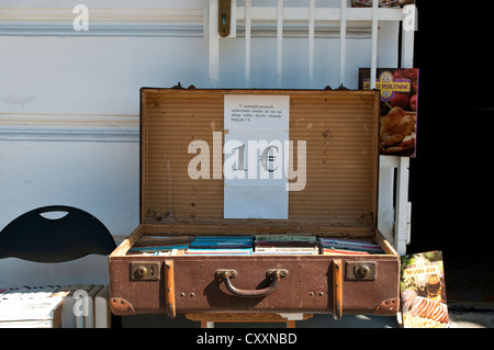 Second-hand books on sale in an old suitcase, Old town, Ljubljana, Slovenia Stock Photo