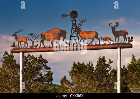 Wrought iron sign at ranch gate near Bandera, Texas, USA Stock Photo