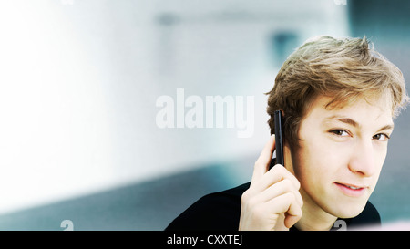 Young businessman, speaking on a mobile phone Stock Photo