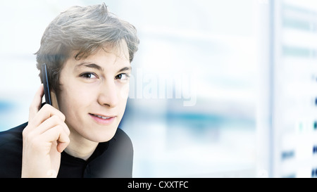 Young businessman, speaking on a mobile phone Stock Photo