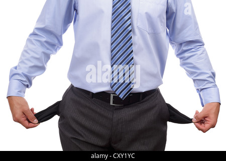 Bankrupt businessman with empty pockets Stock Photo