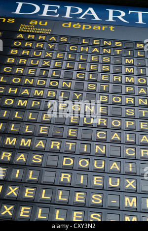 Detail of destinations on departures board at Gare du Nord railway station in Paris France Stock Photo