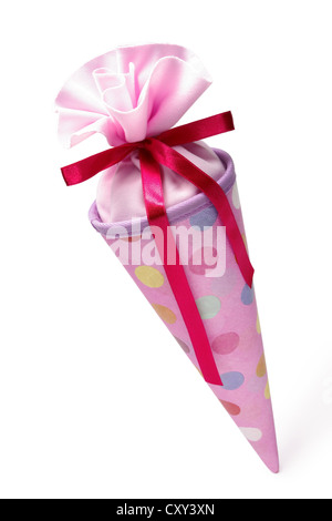 Pink schultuete or school cone filled with gifts and sweets Stock Photo