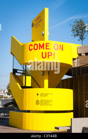 London Southbank bright yellow painted stairs to Royal Festival Queen Elizabeth Hall Roof Garden come on up Stock Photo