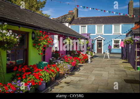 Courtyard with colourful painted shops, Beaumaris, Anglesey, North