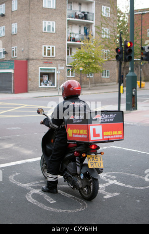 Pizza Hut delivery motorcycle Stock Photo