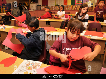 Elvira Elementary School second graders make valentines in Tucson, Arizona, USA. Stock Photo