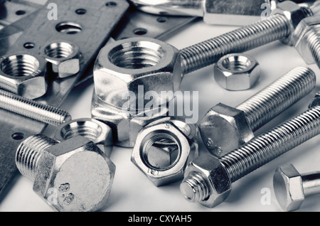 Close-up of various steel nuts and bolts Stock Photo