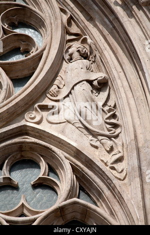 BUDAPEST - SEPTEMBER 22: Detail of angel from south portal on Saint Matthew church on September 22, 2012 in Budapest. Stock Photo